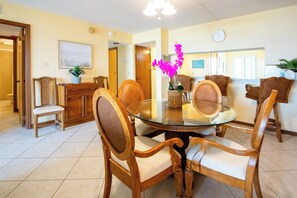 The dining table is conveniently situated that creating a perfect setting for gatherings.