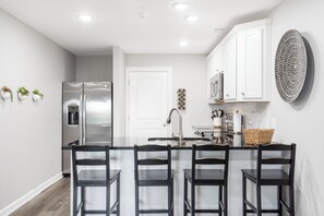 Full Kitchen with Extra Bar Seating