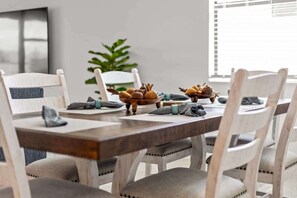 "Dining area designed for delightful gatherings and cozy meals."