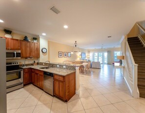 A seamless blend of living, dining, and kitchen spaces, perfect for creating unforgettable memories together.