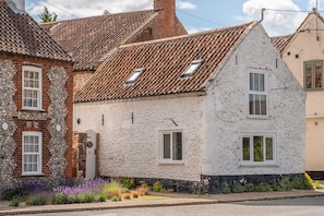 Hayloft, Brancaster: A view of Hayloft from the village road