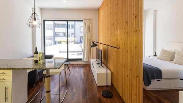 Overview of the apartment's layout, divided by a wooden wall partition #modern #simple