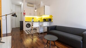 Discover the charm of our living area, adorned with unique accents and comfortable seating #contemporary #practical