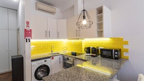 With modern appliances and tasteful design, our kitchenette is the perfect space to cook a delicious snack #practical #simple