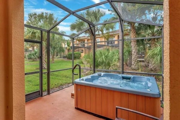 Private covered lanai with hot tub