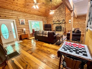Indoors, Hardwood, Stained Wood, Ceiling Fan, Couch