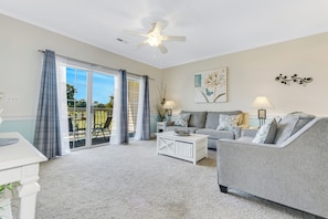 Relax in a cozy and inviting living space, perfect for unwinding after a day at the beach.