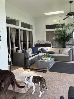 screened in lanai. sliders open onto the lanai from the kitchen/dining area