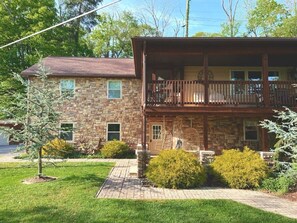The yard is wonderfully maintained with plenty of outdoor space to sit and enjoy the view!