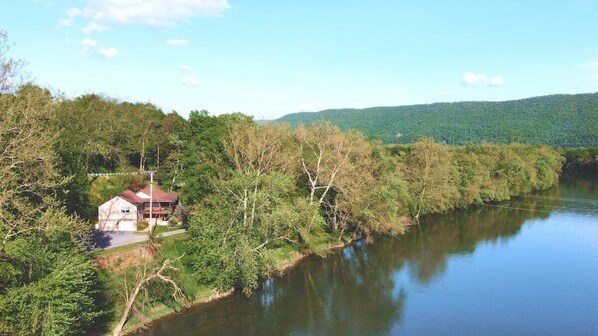 Right on the river, this home is literally steps away from relaxation.