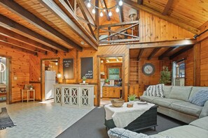 As you step into this beautifully decorated space, a sense of warmth and comfort immediately washes over you. The thoughtfully arranged decor and cozy atmosphere create the perfect backdrop for making lasting memories.