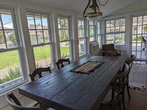 Updated sunroom with dining table/ seating for six