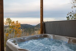 The outdoor space is a true highlight, with a private hot tub for ultimate relaxation after a day of exploring!