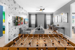 Disney Themed Games Room with Laptop-Friendly Workstations