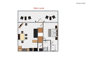 Main level features a large common area with fireplace and large screen TV.