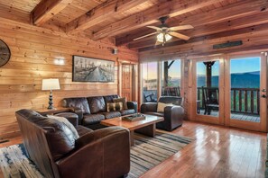 A cozy living room to watch a movie or take in the views!