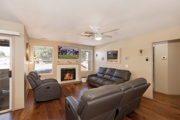 Large Open Living Room with Lots Of Recliners