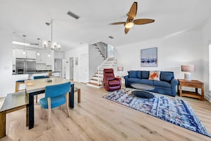 Comfortable seating in the living room with recliner and new queen sleeper sofa