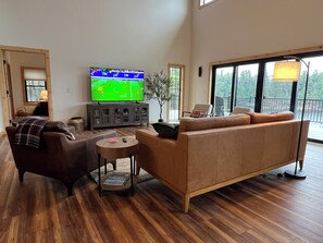 Living room w/ 75-inch Smart TV