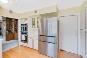 Large fridge and stainless steel oven & microwave 