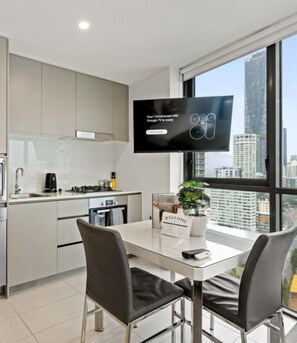 A fully equipped kitchen, complete with essentials such as cooking oil, capsule coffee, tea, and more.