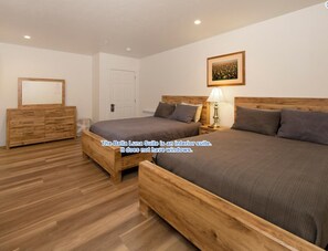 Two queen beds and full bathroom.
*There are no windows in this unit.