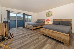 Shogun Suite has two queen beds, Smart TV, private bathroom and a porch.