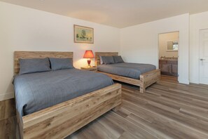 Shogun Suite has two queen beds, Smart TV, private bathroom and a porch.