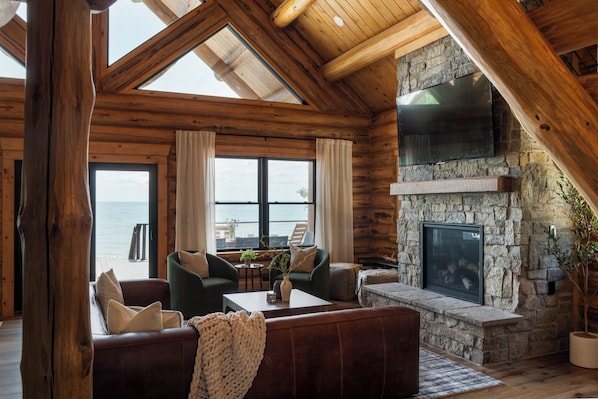Breathtaking waterfront views from the open living room and kitchen. 