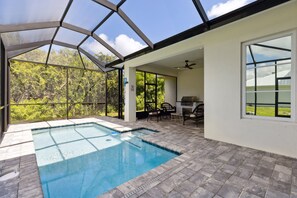 Take a dip in our brand-new screened-in pool—refreshing, private, and perfect for a relaxing swim any time of day!