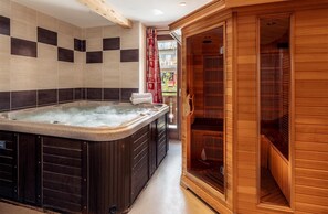 Enjoy the shared indoor hot tub and sauna for a rejuvenating experience after a day of adventure.