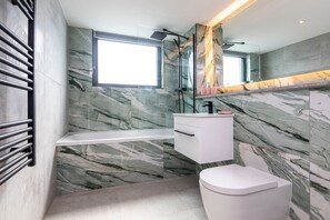 Bathroom with shower over bath
