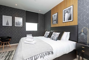 Integrated open-layout living room and bedroom space.