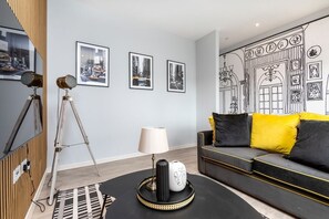 Integrated open-layout living room and bedroom space.