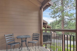 Exterior: Private balcony, bistro table and 2 chairs, mountain and forest views