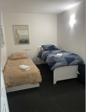 Second bedroom with two single beds