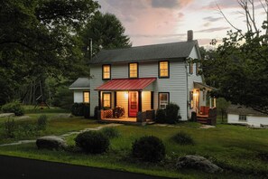 Welcome to The Eldred Homestead, a true escape from the noise. Nestled on over 5 acres with a picturesque pond, this charming cabin blends timeless character with modern comforts.