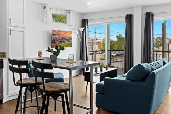 Living Room: Enjoy modern comforts in the eco-friendly ambiance of our home