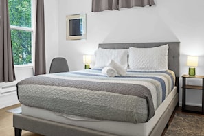Bedroom: Enjoy modern comforts in the eco-friendly ambiance of our home
