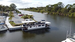  It's all about your water view with boats, dolphins and manatees passin by your front porch all day long. End of canal to left is Intercoastal Waterway