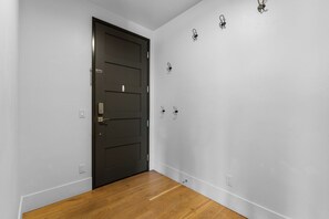 Entryway with hooks for your convenience.