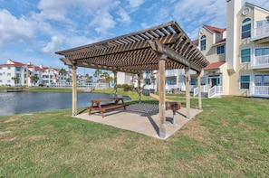 Catch and release pond at Beach Club, with covered picnic and grilling area