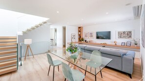 The living room is very spacious and bright with a cozy sofa and a large meal table
#livingroom #comfy #relax #algarve #portugal