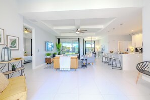 Open Elegance - - Charming layout connects living, dining, and kitchen areas for effortless flow
- Natural light streams through large sliding doors, enhancing the airy ambiance
- Modern furnishings and clean, neutral tones create a sophisticated yet welcoming space
