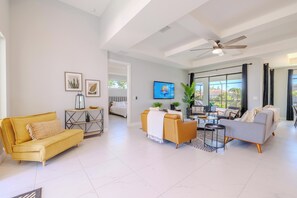 Spacious Comfort - - Bright and open living area with a harmonious mix of contemporary and cozy furnishings
- High ceilings and large windows create an airy, inviting atmosphere
- Thoughtful décor and modern design provide a perfect balance of style and function