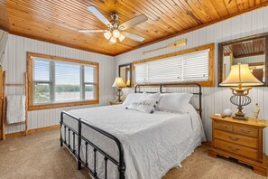 Bedroom 2 features king sized bed and split unit with remote and lake views!