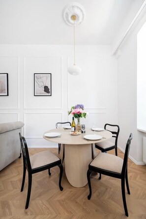 Living Room with Smart TV, Sofa and Dining Table | Book Now with RENTUJEMY.COM