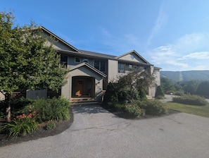Welcome to The Kismet House! Two parking spots in front, view of slopes beyond.