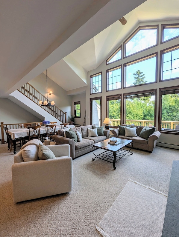 Welcome home with two story windows to take in the views and sunlight!