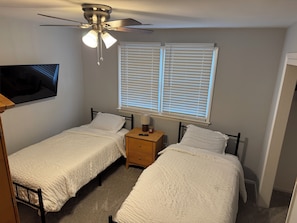 Bedroom #3 with two twin sized beds. 